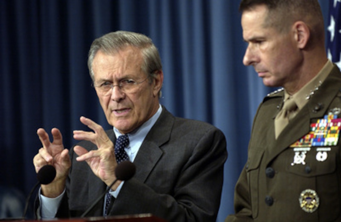 Secretary of Defense Donald H. Rumsfeld responds to a reporter's question during a Pentagon press briefing on Sept. 16, 2003. Rumsfeld and Gen. Peter Pace, U.S. Marine Corps, vice chairman of the Joint Chiefs of Staff, gave reporters an operational update on Operation Iraqi Freedom. 