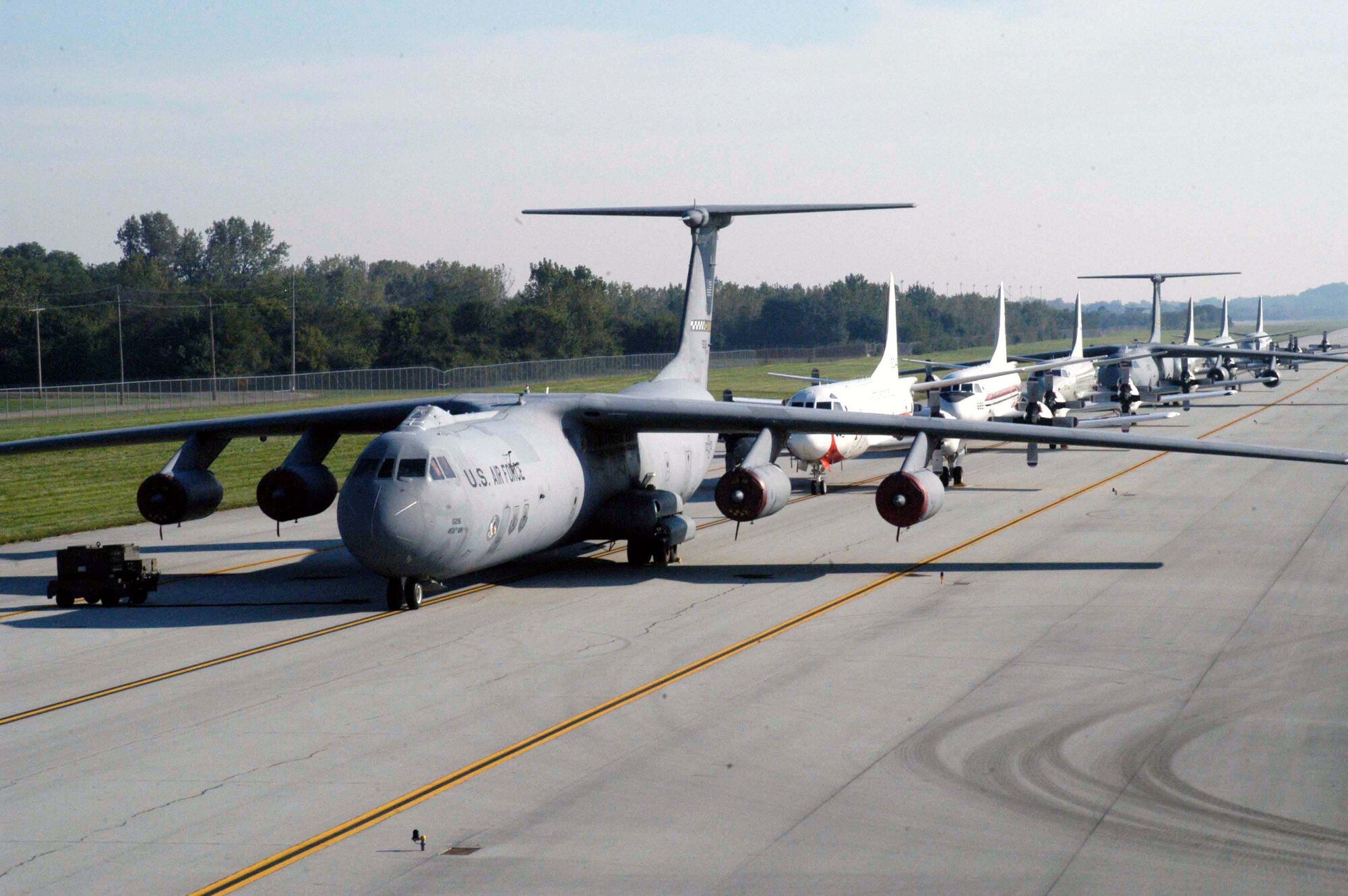 WRIGHT-PATTERSON AIR FORCE BASE, Ohio -- C-141 Starlifters and Navy P-3s arrived here Sept. 17 to escape potential damage by Hurricane Isabel.  Wright-Patterson AFB serves as one of many safe havens for aircraft needing to evacuate because of severe weather.  The C-141s are from Andrews AFB, Md., and the P-3s are from Naval Air Station Patuxent River, Md.  (Courtesy photo)