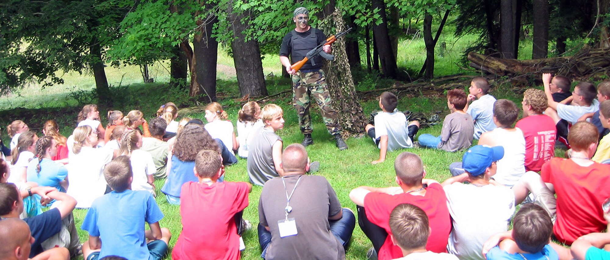 CLARION, Penn. -- Senior Airman Dan Magas demonstrates the finer points of an AK-47 during the Pennsylvania State Police's Camp Cadet program here.  Magas went through the program at age 13, served as a counselor during his teenage years and has returned to serve as a drill instructor three times in his Air Force career.  He is a security controller assigned to the 65th Security Forces Squadron at Lajes Field, Azores.  (Courtesy photo)
