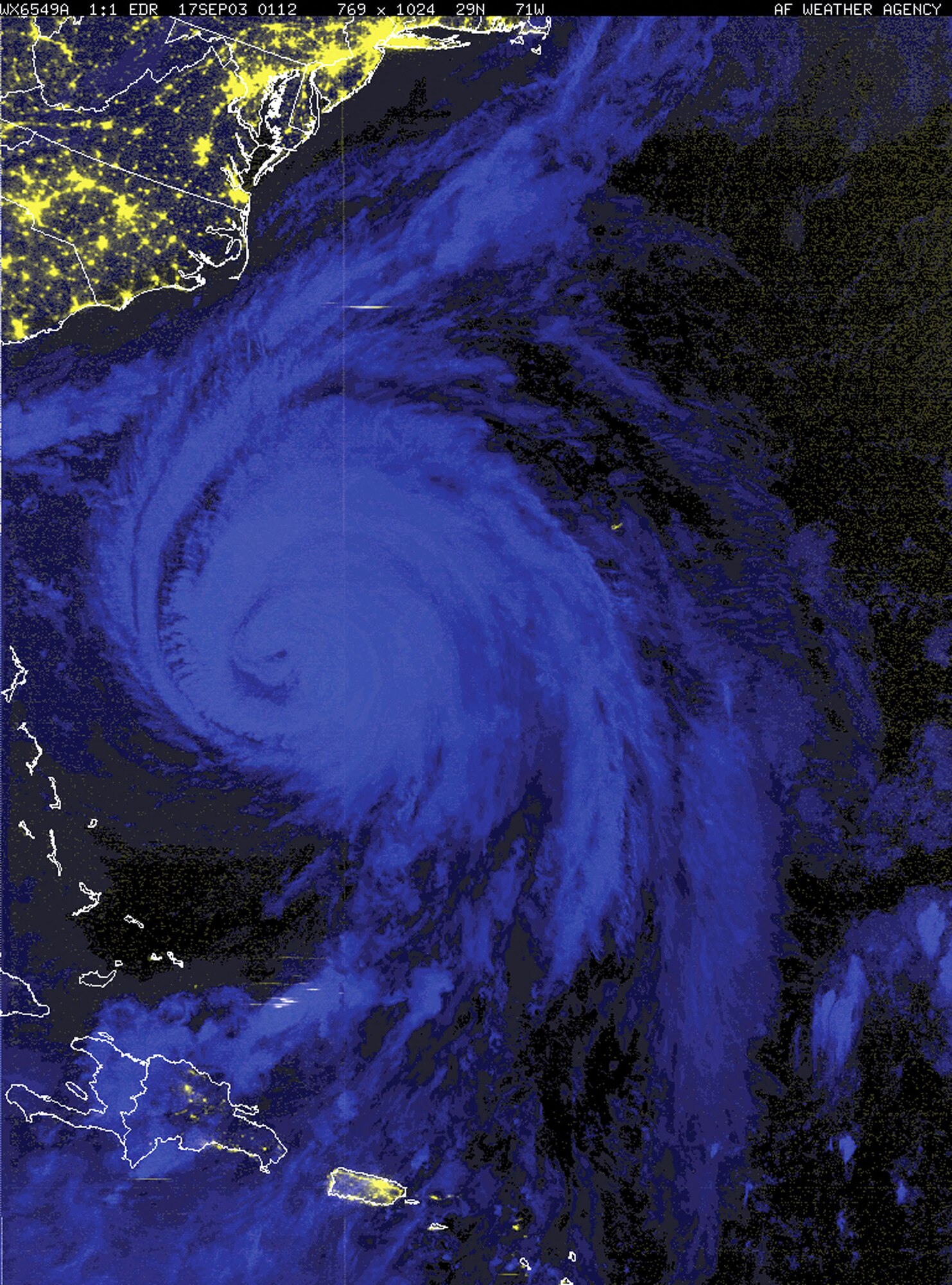 SATELLITE IMAGE -- This Sept. 17 composite of Hurricane Isabel uses two separate satellite images.  The city lights of the East Coast were obtained using visible image capabilities and the hurricane was captured using infrared capabilities.  (Courtesy image)