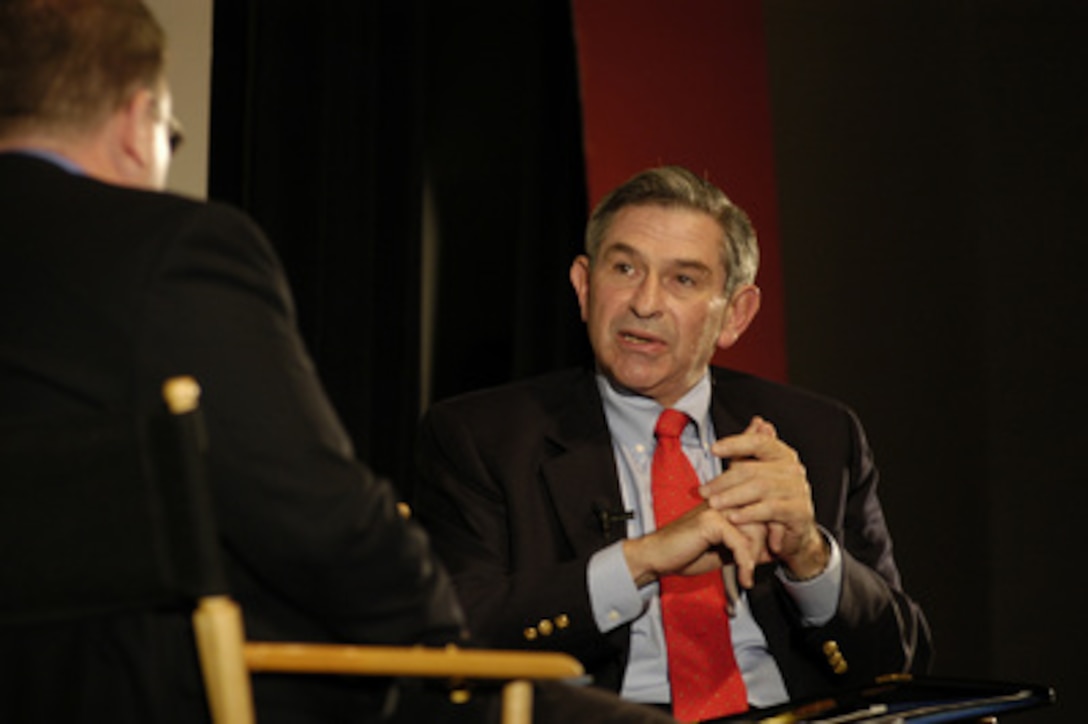 Deputy Secretary of Defense Paul D. Wolfowitz responds to a question from Jeffrey Goldberg of the New Yorker Magazine during the 4th Annual New Yorker Festival on Sept. 21, 2003. Wolfowitz traveled to New York City for the on stage interview and took questions from the audience. 