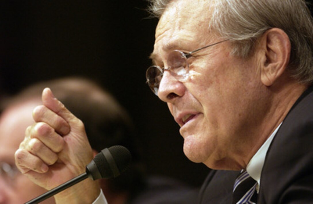 Secretary of Defense Donald H. Rumsfeld testifies before the U.S. Senate Appropriations Committee on Capitol Hill in Washington on Sept. 24, 2003. Chairman of the Joint Chiefs of Staff Gen. Richard Myers, U.S. Air Force, and Commander, U.S. Central Command Gen. John Abizaid, U.S. Army, joined Rumsfeld for the testimony. Rumsfeld urged the committee to move quickly on the request for $87 billion dollars for Iraq and Afghanistan. 