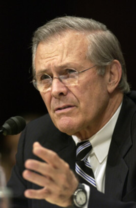 Secretary of Defense Donald H. Rumsfeld testifies before the U.S. Senate Appropriations Committee on Capitol Hill in Washington on Sept. 24, 2003. Chairman of the Joint Chiefs of Staff Gen. Richard Myers, U.S. Air Force, and Commander, U.S. Central Command Gen. John Abizaid, U.S. Army, joined Rumsfeld for the testimony. Rumsfeld urged the committee to move quickly on the request for $87 billion dollars for Iraq and Afghanistan. 