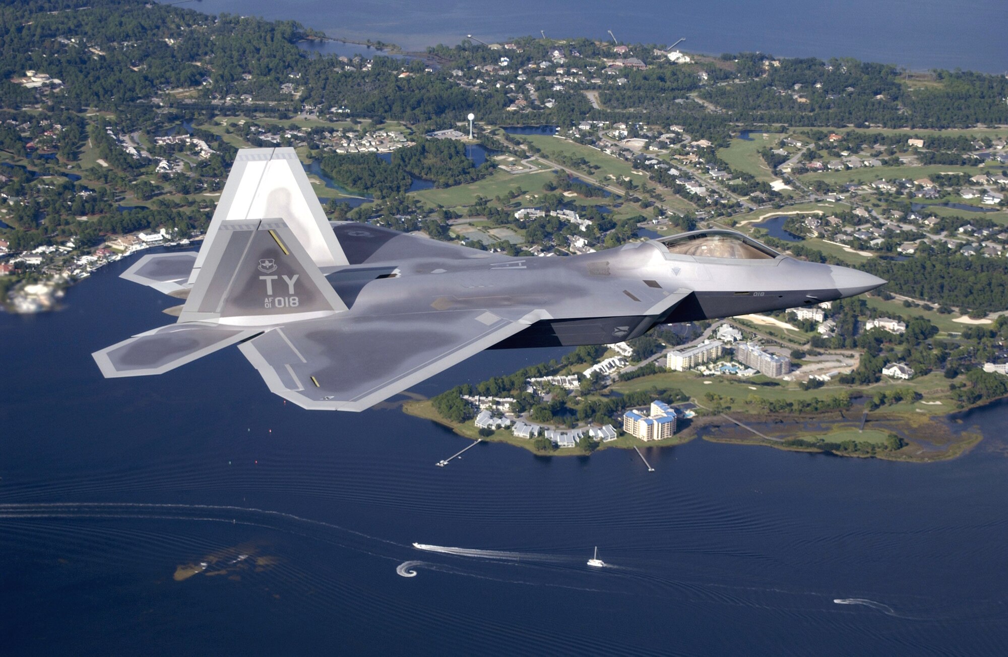 TYNDALL AIR FORCE BASE, Fla. -- The first operational F/A-22 Raptor cruises over Florida on its delivery flight to Tyndall, home of the world's first Raptor squadron.  (U.S. Air Force photo by Tech. Sgt. Mike Ammons)