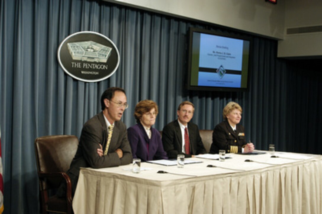 Under Secretary of Defense for Personnel and Readiness David S.C. Chu (left) announces the Defense Integrated Military Human Resources System to reporters at a Pentagon press briefing on Sept. 29, 2003. The new web-based system will integrate all of the service's military personnel and pay systems. Chu is joined by Norma St. Claire, director, Joint Requirements and Integration Office; Steven Ehrler, Navy Program Executive Officer for Information Technology; and Navy Capt. Valerie Carpenter, joint program manager, Defense Integrated Military and Human Resources System (Personnel/Pay). 