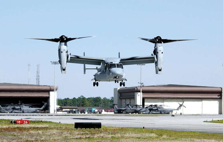 HURLBURT FIELD, Fla. -- A Marine Corps MV-22 Osprey lands here April 2 on its way to an air show at Eglin Air Force Base, Fla.  Air Force Special Operations Command is expected to get 50 CV-22s, an Air Force-modified version of the MV-22, starting November 2006.  Designed to conduct long-range missions, the tilt-rotor aircraft offers increased speed and range over other rotary-wing aircraft.  Two CV-22s are currently at Edwards AFB, Calif., undergoing operational testing.  (U.S. Air Force photo by Staff Sgt. Greg Davis)