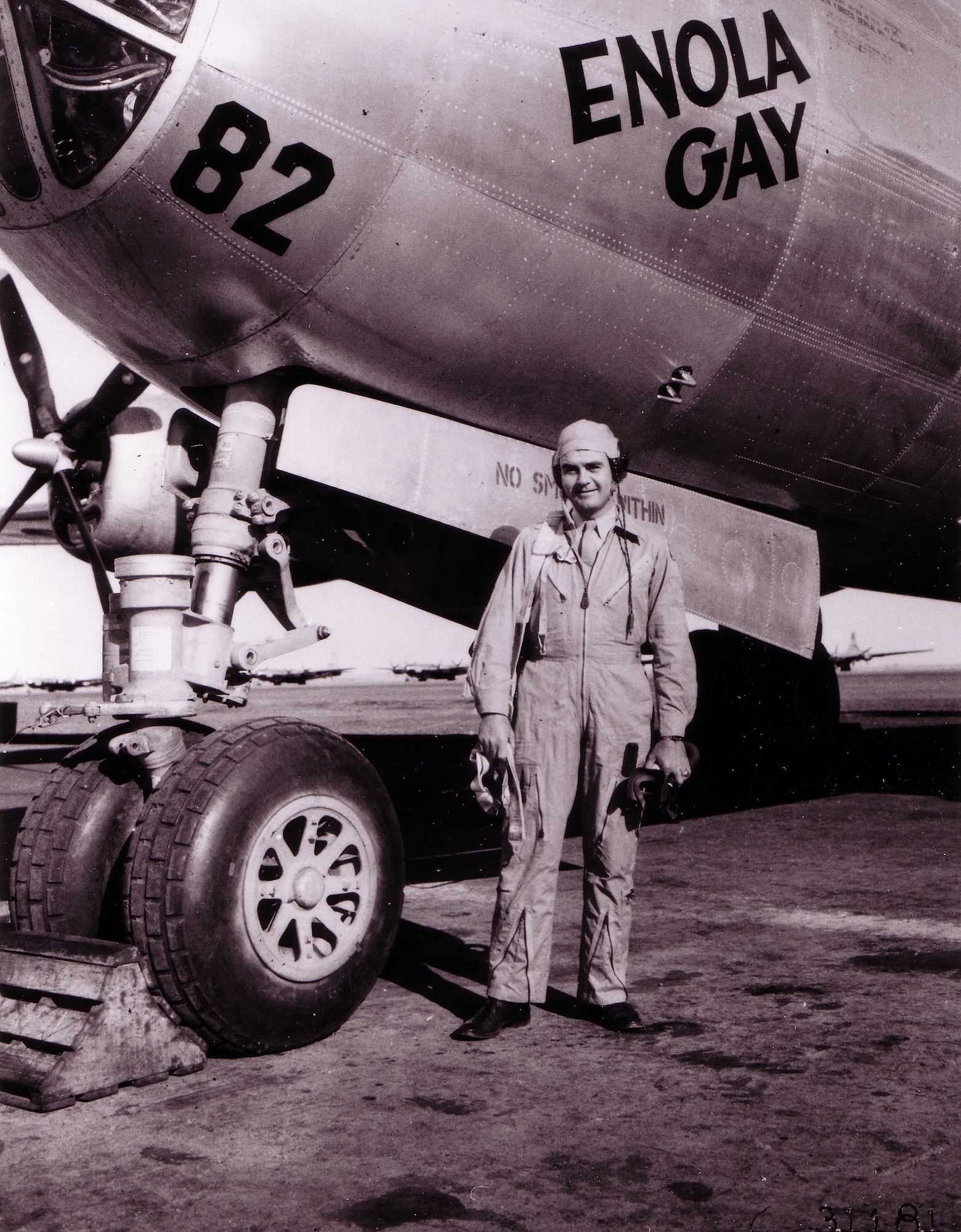 1940's -- ROSWELL ARMY AIR FIELD, New Mexico -- Col. Paul Tibbetts, Jr., of Miami, Fla., poses in front of his B-29 Superfortress "The Enola Gay" (named for his mother).  The Enola Gay is the same plane he piloted when his bombardier dropped the first atom bomb over Hiroshima, Japan. (U.S. Air Force photo)