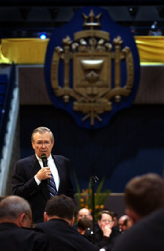 Secretary of Defense Donald H. Rumsfeld addresses the All Flag Officer Training Symposium in alumni Hall at the Naval Academy in Annapolis, Md., on April 5, 2004. 