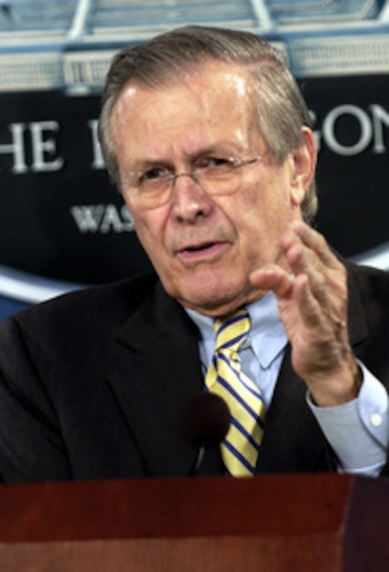 Secretary of Defense Donald H. Rumsfeld and Chairman of the Joint Chiefs of Staff Gen. Richard B. Myers conduct a press briefing in the Pentagon on April 7, 2004. Rumsfeld and Myers discussed troop redeployments and the uprising of anti-coalition forces in Fallujah and Ar Ramadi, Iraq. 