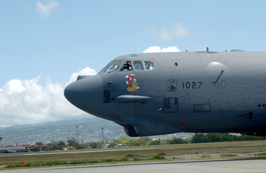 HICKAM AIR FORCE BASE, Hawaii -- A B-52 Stratofortress sits on the runway April 6.  Four B-52s arrived here from Andersen Air Force Base, Guam, to escape Typhoon Sudal which missed the island April 7.  The B-52s are deployed to Andersen from Minot AFB, N.D.  (U.S. Air Force photo by Mike Dey)