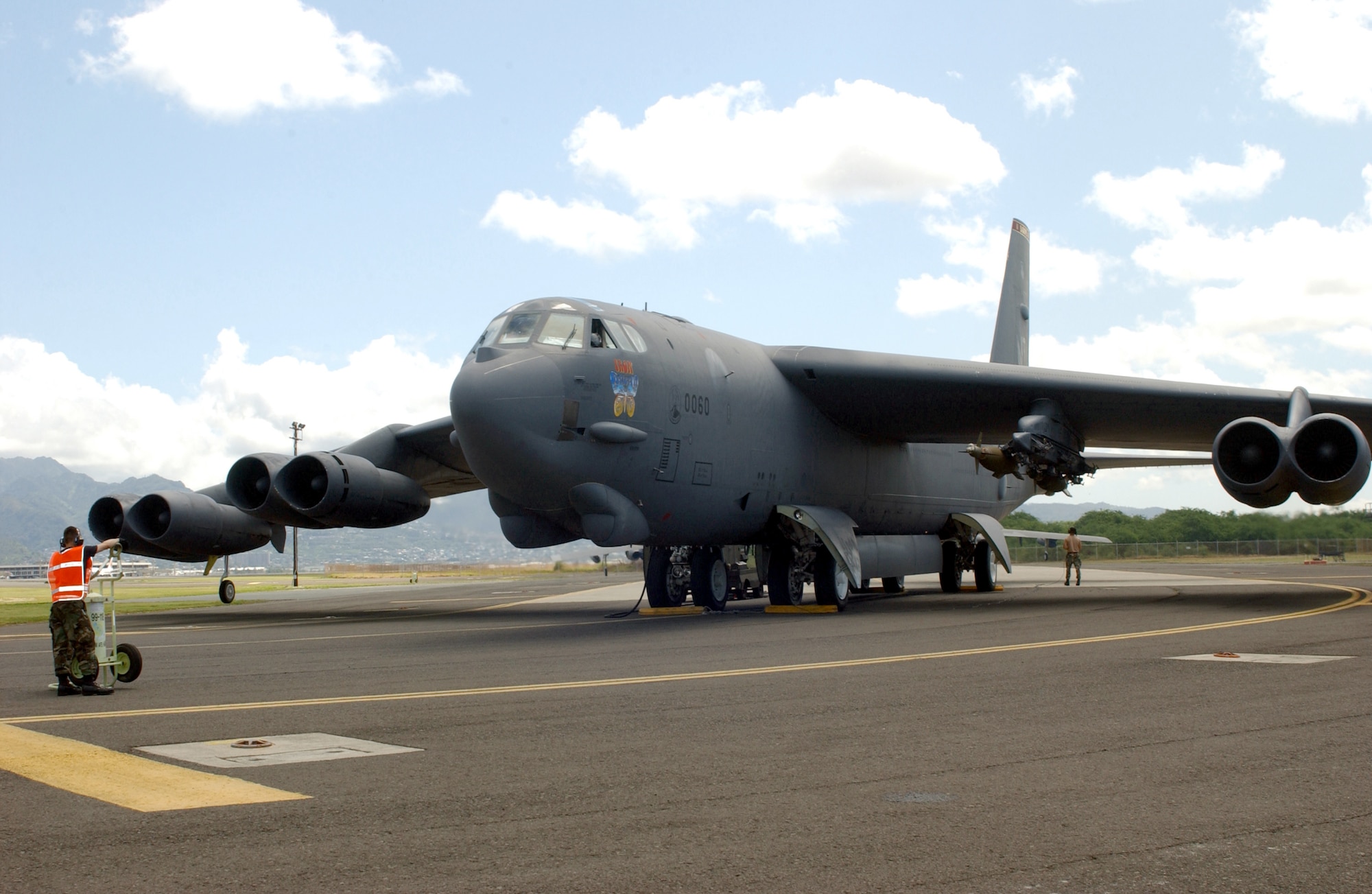HICKAM AIR FORCE BASE, Hawaii -- A B-52 Stratofortress is prepared for take off on the runway April 6.  Four B-52s arrived here from Andersen Air Force Base, Guam, to escape Typhoon Sudal which missed the island April 7.  The B-52s are deployed to Andersen from Minot AFB, N.D.  (U.S. Air Force photo by Mike Dey)