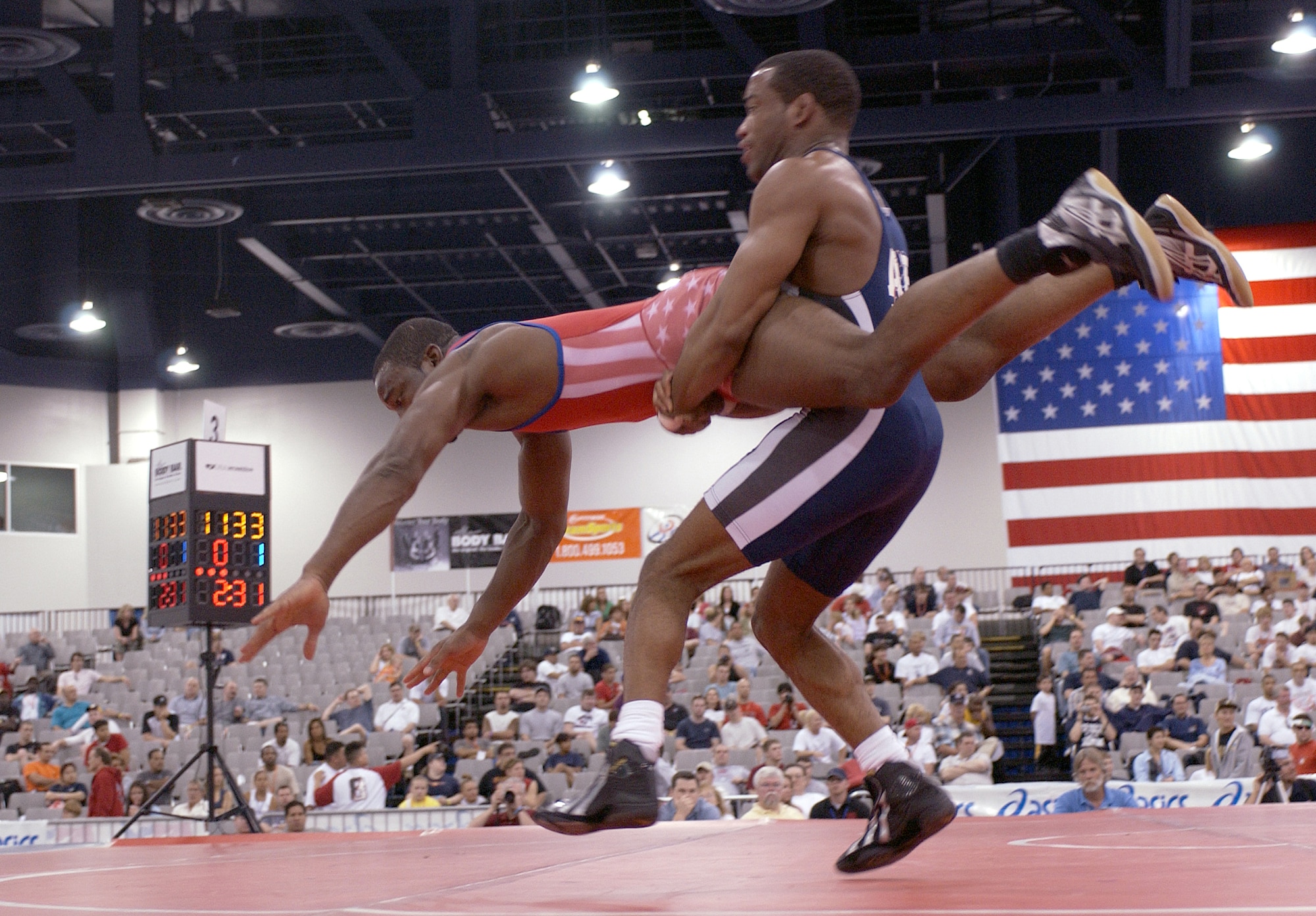 LAS VEGAS -- Steve Woods, 2004 armed forces champion in the 163-pound Greco-Roman wrestling division, spins an opponent during the U.S. National Wrestling Championships here April 9.  Woods took the silver in his division and will represent the Air Force at the U.S. Olympic trials May 21 to 23 in Indianapolis. (U.S. Air Force photo by Airman 1st Class Daniel DeCook)             