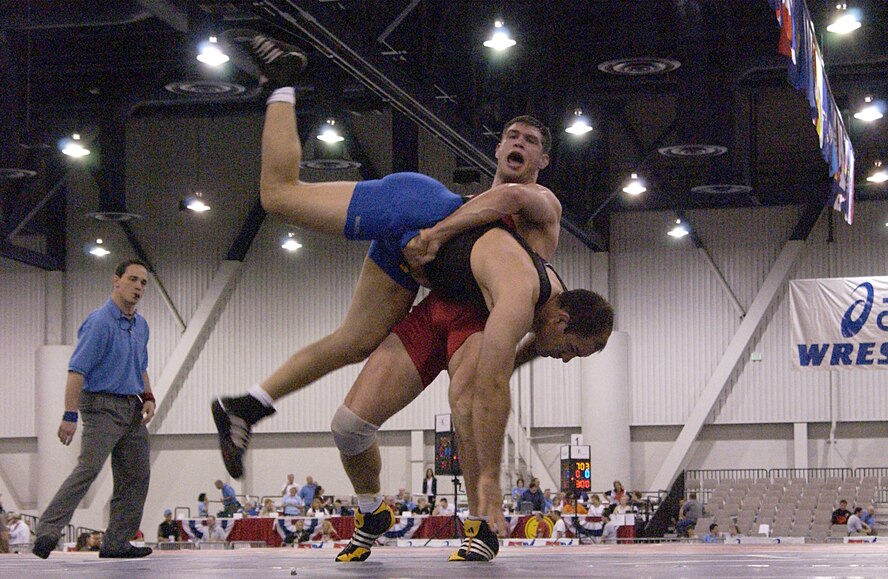 LAS VEGAS -- Philip Johnston, a 211.5-pound-division Greco-Roman wrestler, lifts an opponent during his final match in the 2004 U.S. National Wrestling Championships held here April 9.  Johnston finished seventh in his division.  (U.S. Air Force photo by Airman 1st Class Daniel DeCook)