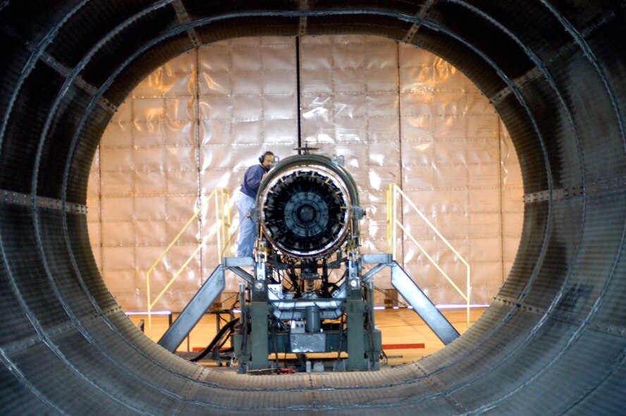 ROBINS AIR FORCE BASE, Ga. -- Barbara Estrada prepares to test an F-15 Eagle engine in the "hush house" here.  She is an aircraft engine mechanic and part of a four-person crew working full time in the facility.  (U.S. Air Force photo by Sue Sapp)
