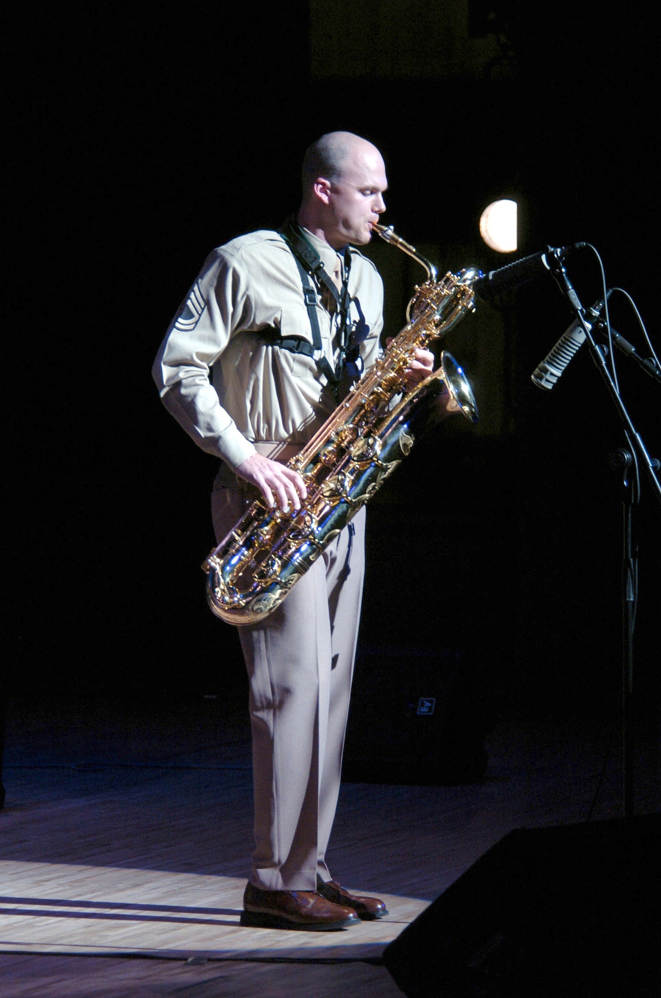 HIROSHIMA, Japan -- Staff Sgt. Jeff Saunders entertains a crowd during a concert here.  Hansen is a saxophone player from the U.S. Air Force Band of the Pacific-Asia based at Yokota Air Base, Japan.  He wore a traditional U.S. Army Air Corps uniform as part of the band's trademark Glenn Miller show.  (U.S. Air Force photo by Master Sgt. Val Gempis)