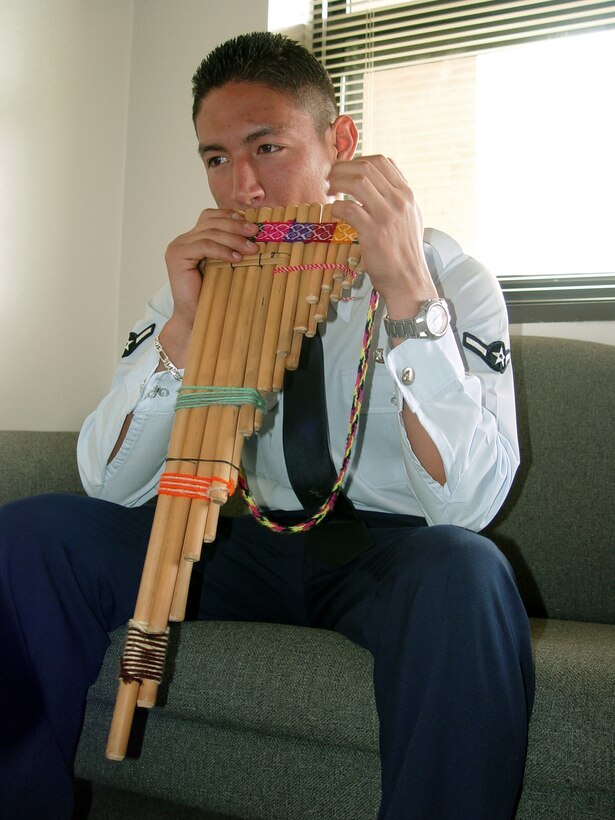 MCCONNELL AIR FORCE BASE, Kan. -- Airman Fredy Pasco plays the zampoña, an Inca instrument he has been playing since he was 6 years old.  He came to America from Peru on April 16, 1998, and joined the Air Force in September 2003.  (U.S. Air Force photo by Airman 1st Class Harold Barnes III)