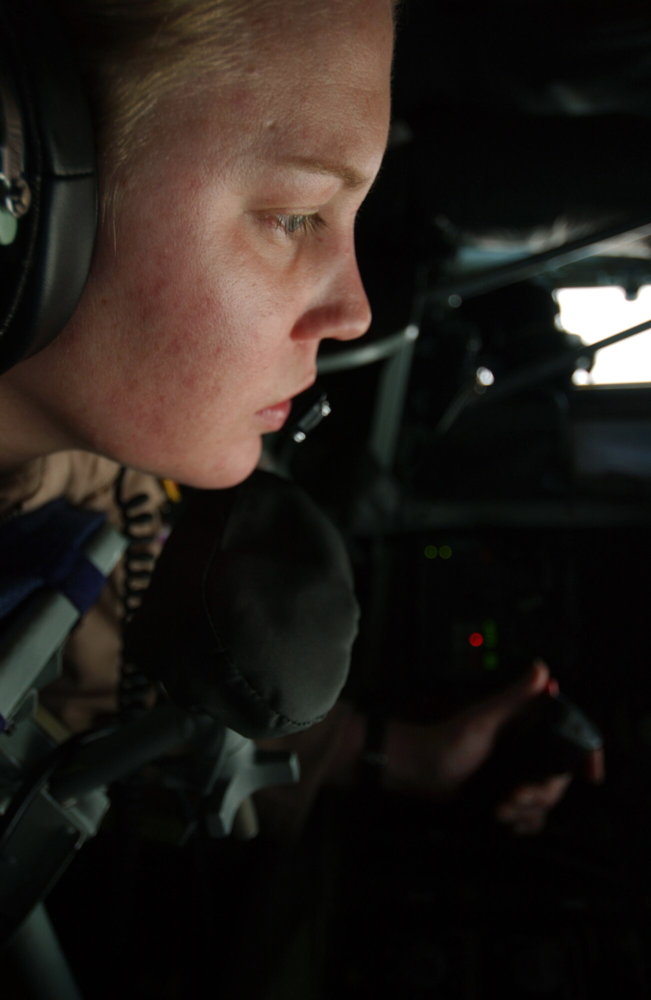 SOUTHWEST ASIA -- Senior Airman Casey Killian refuels an F-16 Fighting Falcon supporting Operation Iraqi Freedom on April 21.  Airman Killian pumped the 1 billionth pound of fuel passed by Combined Forces Air Component Command aircraft since Jan. 30, 2003.  She is a boom operator with the 340th Expeditionary Air Refueling Squadron.  (U.S. Air Force photo by Staff Sgt. Aaron Allmon II)