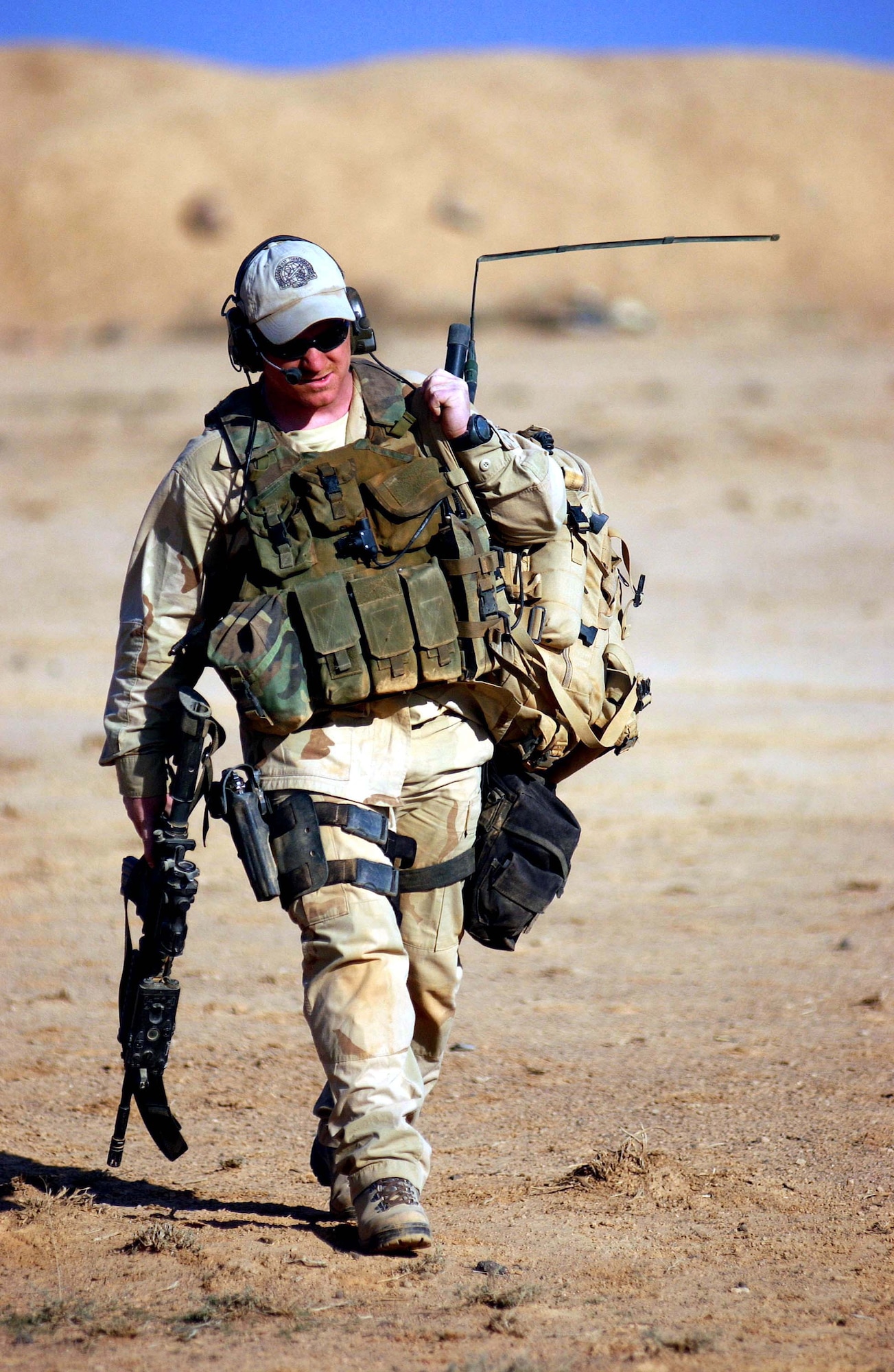 OPERATION ENDURING FREEDOM -- A combat controller walks back to his teammates after practicing firing movements at an undisclosed location.  (U.S. Air Force photo by Staff Sgt. Jeremy T. Lock)