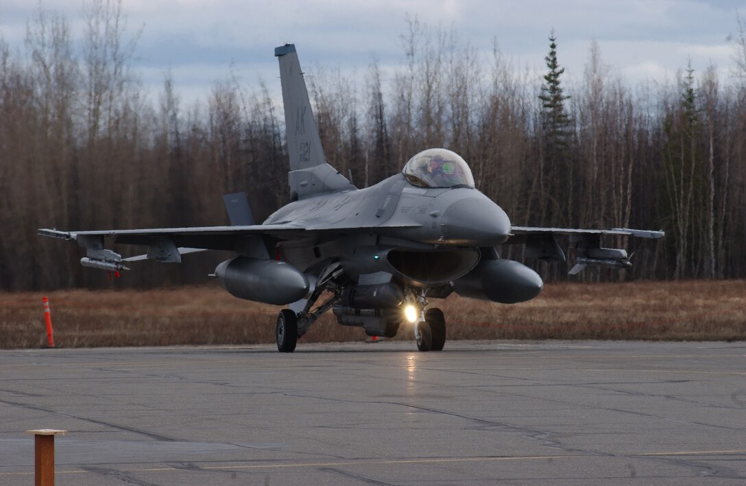 EIELSON AIR FORCE BASE, Alaska -- An F-16 Fighting Falcon from the 18th Fighter Squadron waits to taxi to its parking spot during an operational readiness inspection here April 28. (U.S. Air Force photo by Senior Airman Joshua Strang)