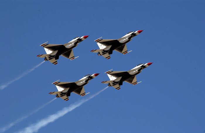 OVER MARCH AIR RESERVE BASE, Calif. -- Four F-16 Fighting Falcons from the U.S. Air Force Thunderbirds flight demonstration team fly in diamond formation during Airfest 2004 here April 24.  The F-16s are assigned to the U.S. Air Force Air Demonstration Squadron at Nellis Air Force Base, Nev. (U.S. Air Force photo by Tech. Sgt. Joe Zuccaro)