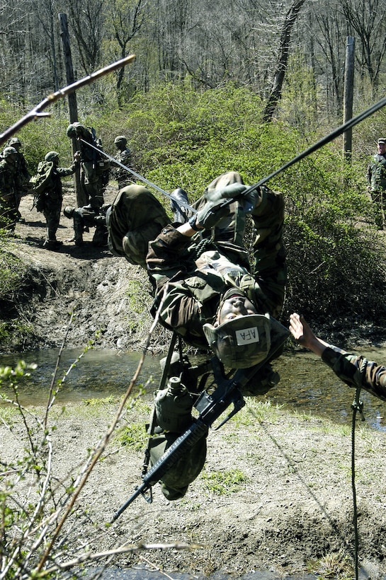 WEST POINT, N.Y. -- Crossing a stream via zip line was only one obstacle 11 U.S. Air Force Academy cadets conquered during nine field events at the Sandhurst competition here April 24.  The cadets placed fourth out of 45 teams entered in the event.  (U.S. Air Force photo by 1st Lt. Melissa Waheibi)