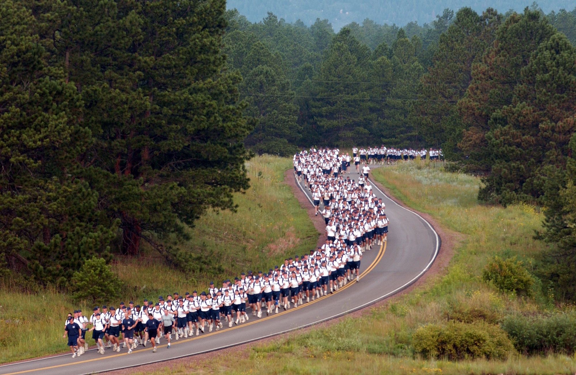U.S. AIR FORCE ACADEMY, Colo. -- More than 1,200 people from the Air Force Academy's Class of 2008 begin their 36-mile relay "Warrior Run."  The relay began at the school's Jacks Valley training area then meandered through Pike National Forest.  The 11-leg, seven-hour run is the final event for the class's basic cadet training.  (U.S. Air Force photo by Ken Wright)               