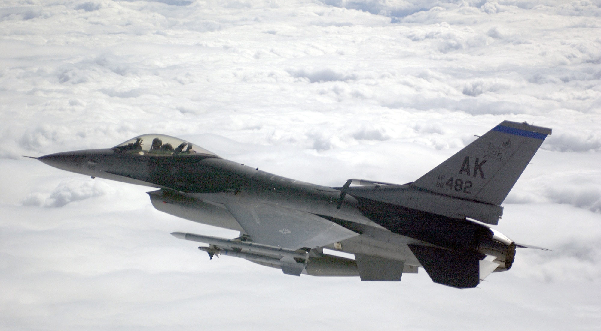 OVER EIELSON AIR FORCE BASE, Alaska -- An F-16C Fighting Falcon aircraft from the 18th Fighter Squadron flies during a training mission here July 27. (U.S. Air Force photo by Staff Sgt. Matthew Hannen)