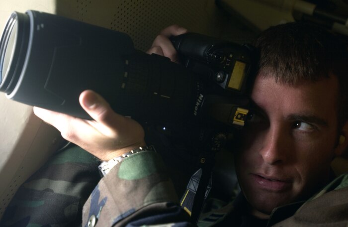 OVER EIELSON AIR FORCE BASE, Alaska -- Capt. Alan Amato takes pictures of an Indian GR-1 aircraft being refueled by an IL-78 here July 31 during exercise Cooperative Cope Thunder.  Captain Amato is assigned to the 1st Combat Camera Squadron, Charleston Air Force Base, S.C. (U.S. Air Force photo by Staff Sgt. Matthew Hannen) 
