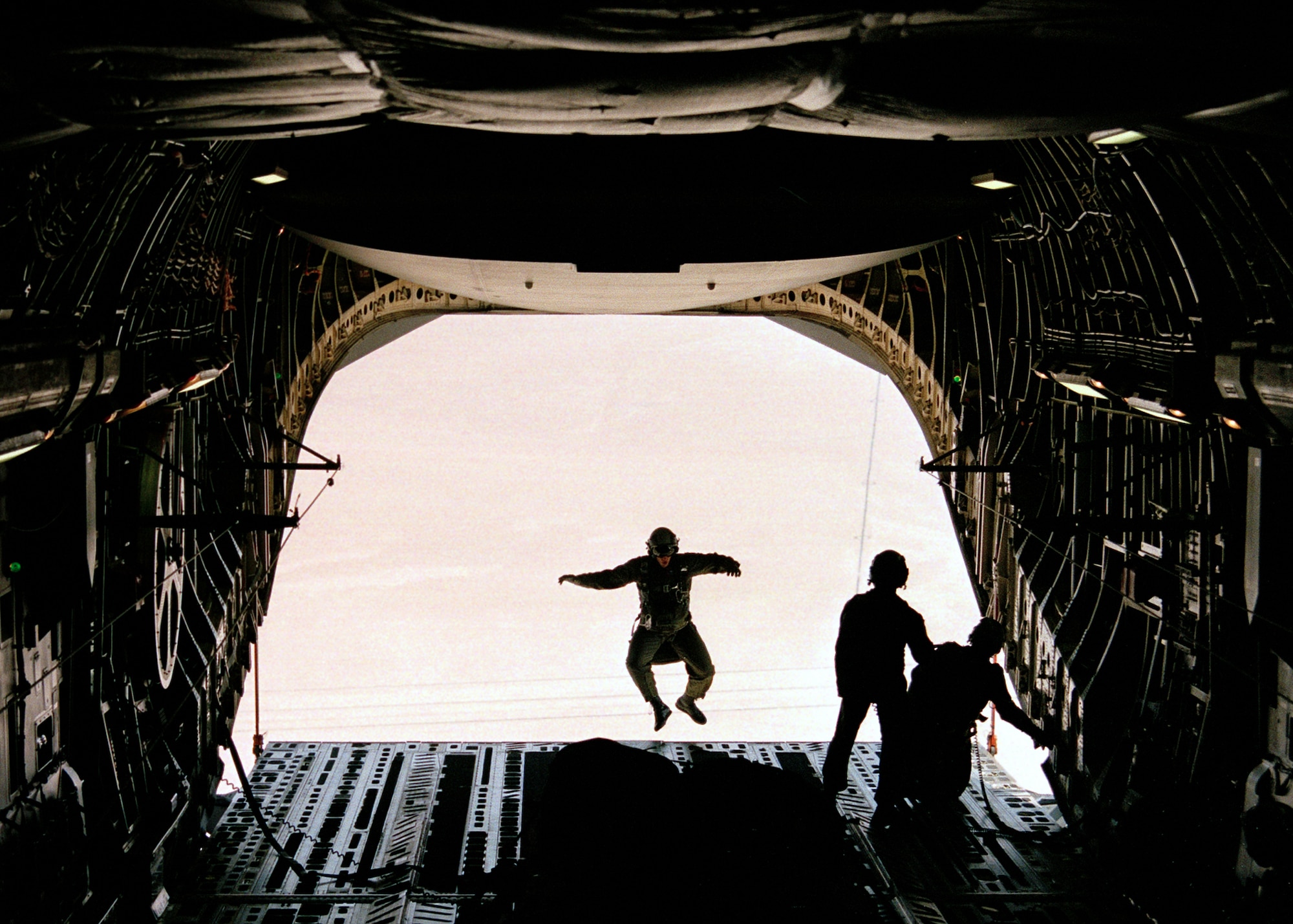 EDWARDS AIR FORCE BASE, Calif. (AFPN) --Testers at here, conduct egress training during earlier test missions aboard the C-17 Globemaster III. An Air Force test team is working with soldiers at Fort Bragg, N.C., to conduct egress and airdrop tests designed to improve the aircraft's support of real-world military missions. (Air Force photo by Airman 1st Class Matthew Dillier)