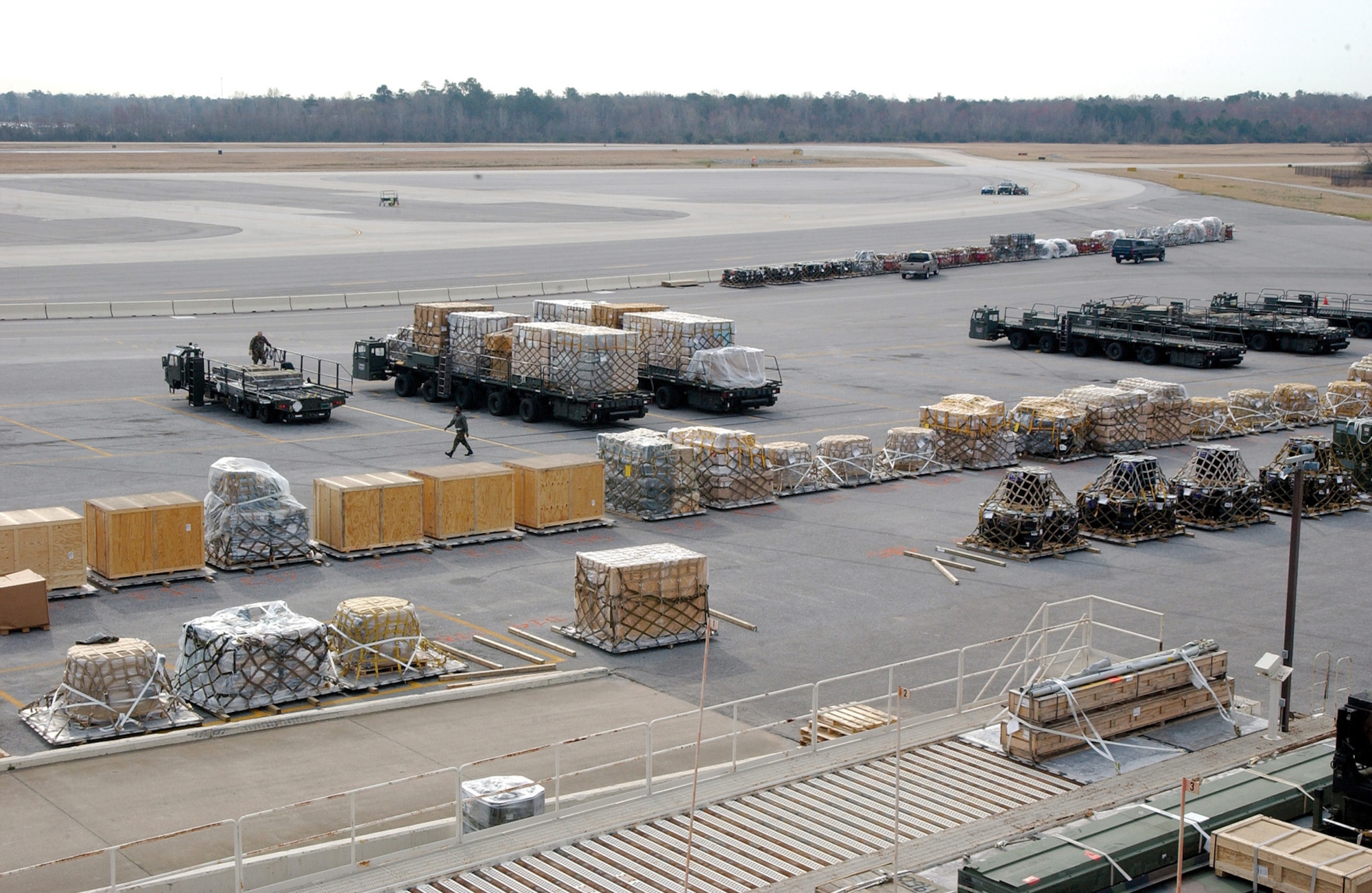 CHARLESTON AIR FORCE BASE, S.C. -- Pallets line the flightline at Charleston Air Force Base, S.C. The workload at the base's 437th Aerial Port Squadron increased an estimated 250 percent after two APS buildings at Dover Air Force Base, Del., collapsed under snow from a blizzard.  (U.S. Air Force photo by Airman 1st Class Jason Bailey)