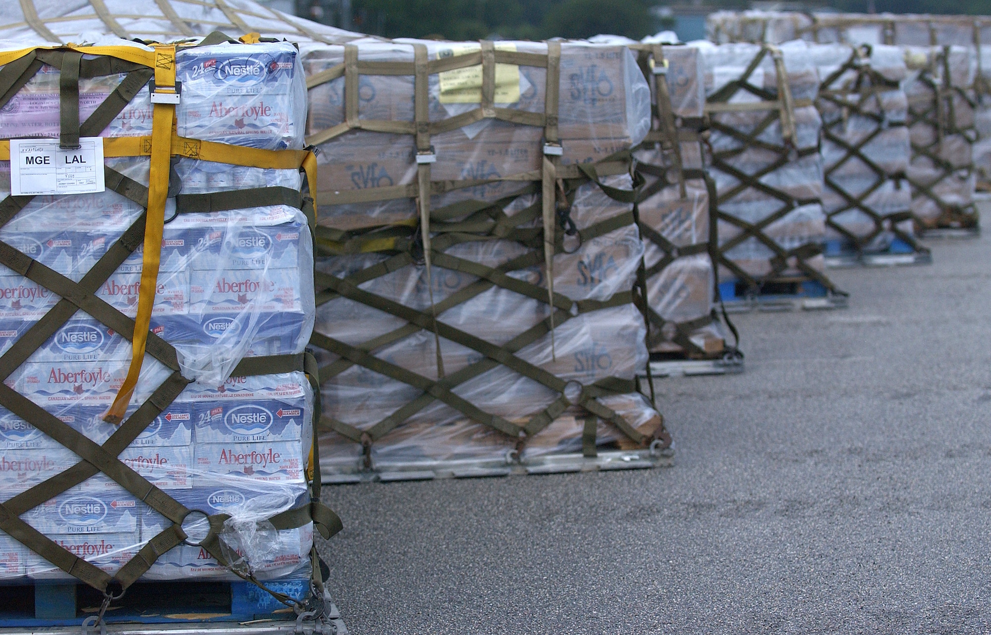 LAKELAND, Fla. -- Pallets wait in a staging area here before being distributed to Hurricane Charley victims Aug. 14.  Lakeland Regional Airfield has become the center of relief operations in Florida for the Federal Emergency Management Agency.  The U.S. Air Force is providing support by airlifting equipment, people and supplies, expediting the delivery of the items.  (U.S. Air Force photos by Tech. Sgt. Mike Buytas)