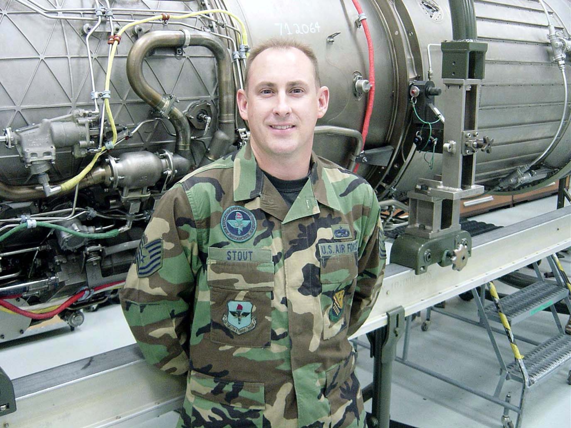 LUKE AIR FORCE BASE, Ariz. -- Tech. Sgt. Scott Stout joined the Air Force to gain the professionalism he saw in his father and said today he wants to share his dedication to service with everyone he meets.  He is an F-15 Eagle maintenance trainer here.  (Courtesy photo)