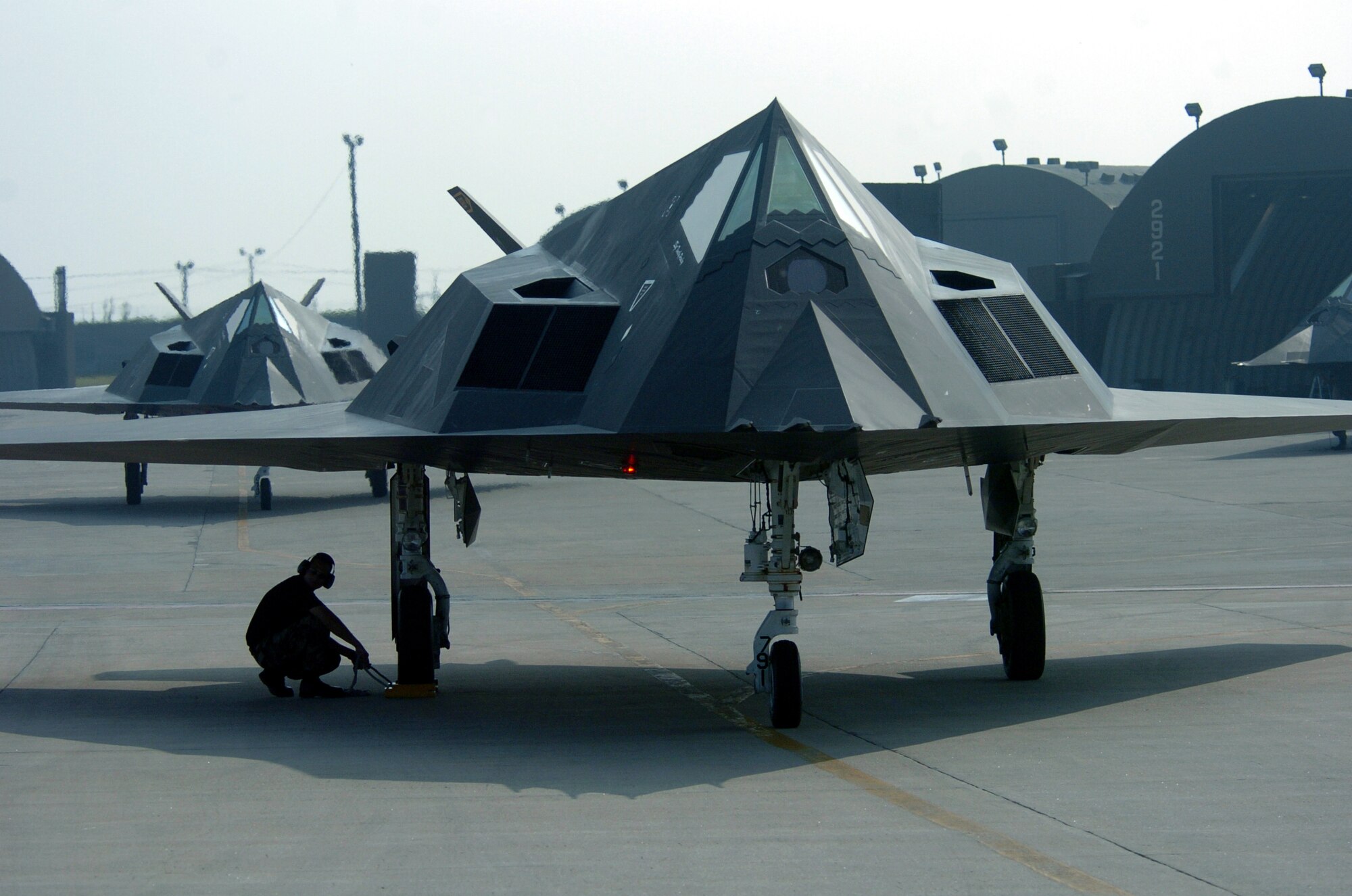 KUNSAN AIR BASE, South Korea -- Senior Airman Tony Kepo'o prepares to pull the wheel chock during an end-of-runway check on an F-117 Nighthawk here.  He is a crew chief from the 49th Maintenance Squadron at Holloman Air Force Base, N.M.  About 300 Airmen from Holloman are currently deployed here supporting operations in the Pacific region.  (U.S. Air Force photo by Master Sgt. Val Gempis)