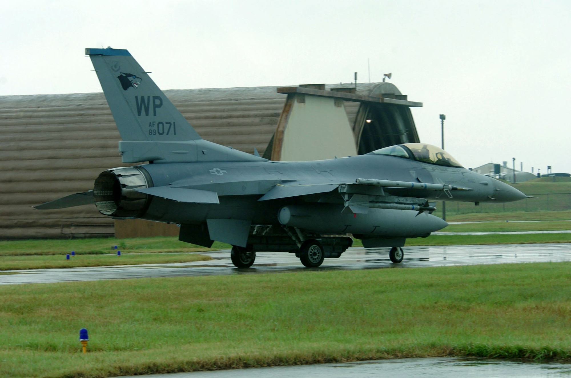 KUNSAN AIR BASE, South Korea -- A 35th Fighter Squadron F-16 Fighting Falcon taxis out for a mission here.  The aircraft is flown by the squadron's 1st Lt. John Wilson.  (U.S. Air Force photo by Master Sgt. Val Gempis)