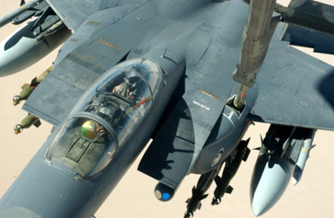 A U.S. Air Force F-15 Strike Eagle receives fuel from a KC-10 Extender over Baghdad, Iraq, on Aug. 16, 2004. 