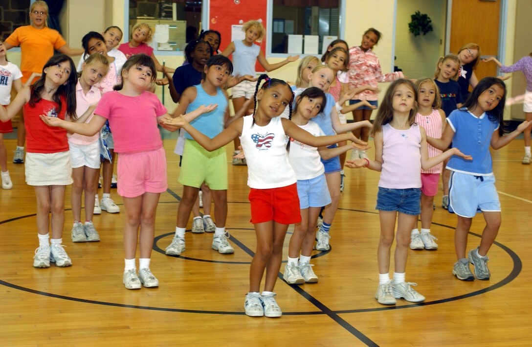 LAJES FIELD, Azores - A group of young girls practice various dance routines during Cheerleading Camp here Aug. 17.  The week-long camp ends with a presentation for the parents.  (U.S. Air Force photo by Staff Sgt. Michelle Michaud)