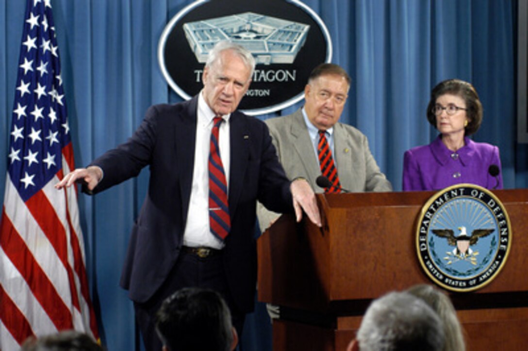 Independent Panel Chairman James Schlesinger (left) talks to reporters about the findings and recommendations of the Independent Panel to Review Department of Defense Detention Operations during a Pentagon press conference following the delivery of their final report to Secretary of Defense Donald H. Rumsfeld, on Aug. 24, 2004. Retired Air Force Gen. Charles A. Horner (center), former U.S. Representative Tillie K. Fowler and former Secretary of Defense Harold Brown via telephone, joined Schlesinger to discuss the findings and recommendations allegations and investigations of abuse at DoD detention facilities. Schlesinger was secretary of defense for Presidents Nixon and Ford and secretary of energy for President Carter. 