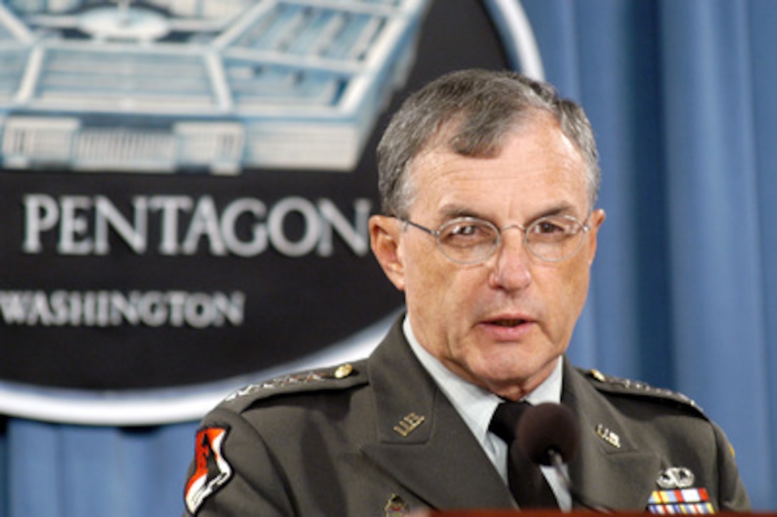 Army Gen. Paul Kern briefs reporters at the Pentagon on the Army's investigation into abuse of prisoners at the Abu Ghraib prison on Aug. 25, 2004. 