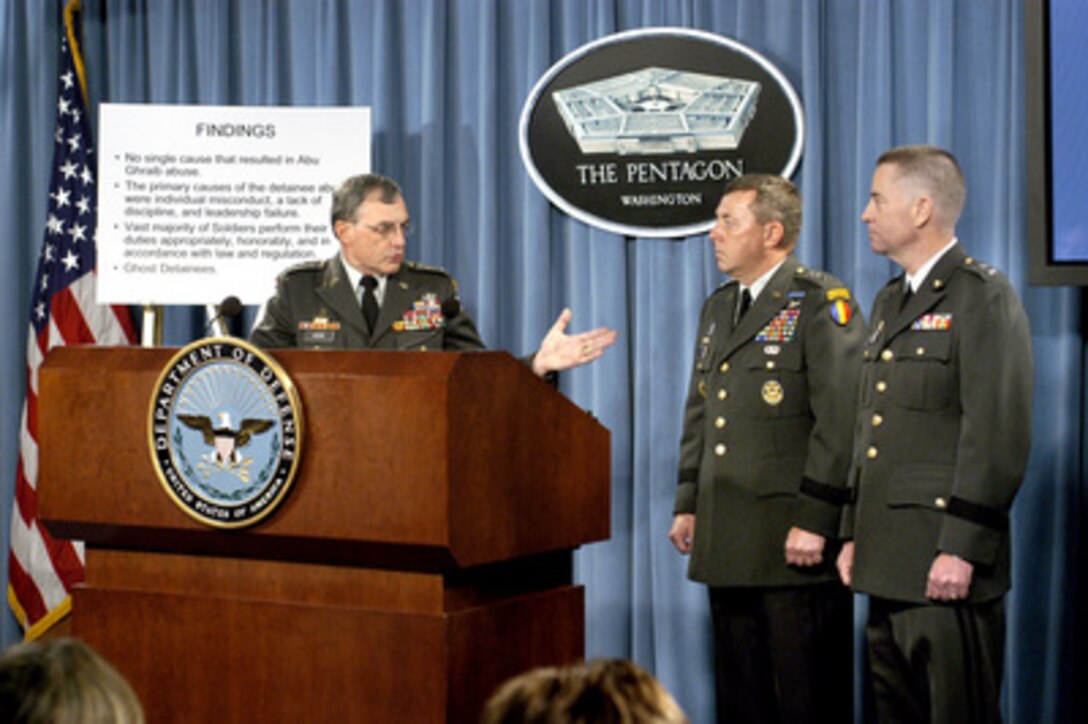 Army Gen. Paul Kern (left) introduces Lt. Gen. Anthony Jones (center) and Maj. Gen. George Fay (right) at an Aug. 25, 2004, Pentagon press conference to discuss the findings of their investigation into abuse of prisoners at the Abu Ghraib prison. 
