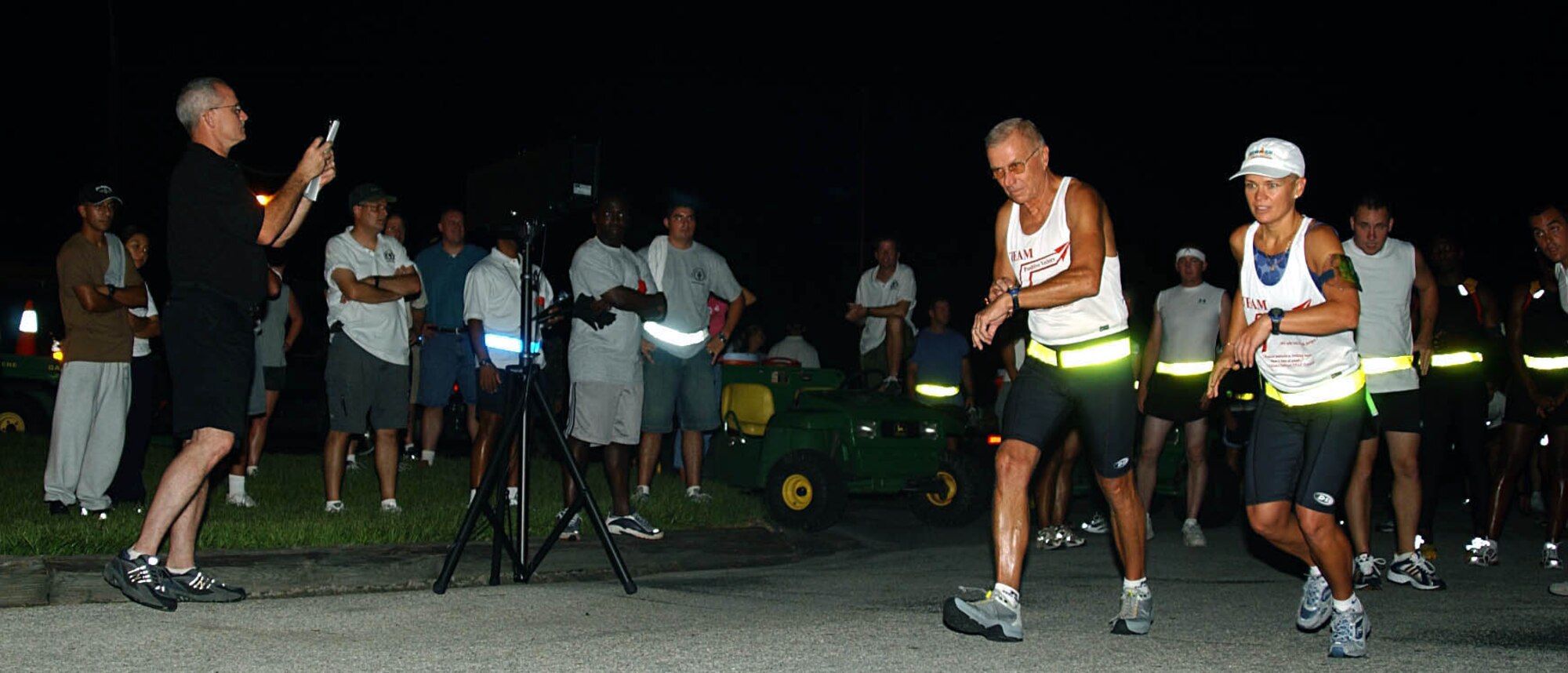 MACDILL AIR FORCE BASE, Fla. -- A father-daughter combo team starts Enduro Challenge here at about 5 a.m.  First Lt. Mara Fair and her father, Jack, traveled from Eglin Air Force Base, Fla., to compete in the one-of-a-kind adventure race Aug. 21.  (U.S. Air Force photo by Staff Sgt. Randy Redman)  