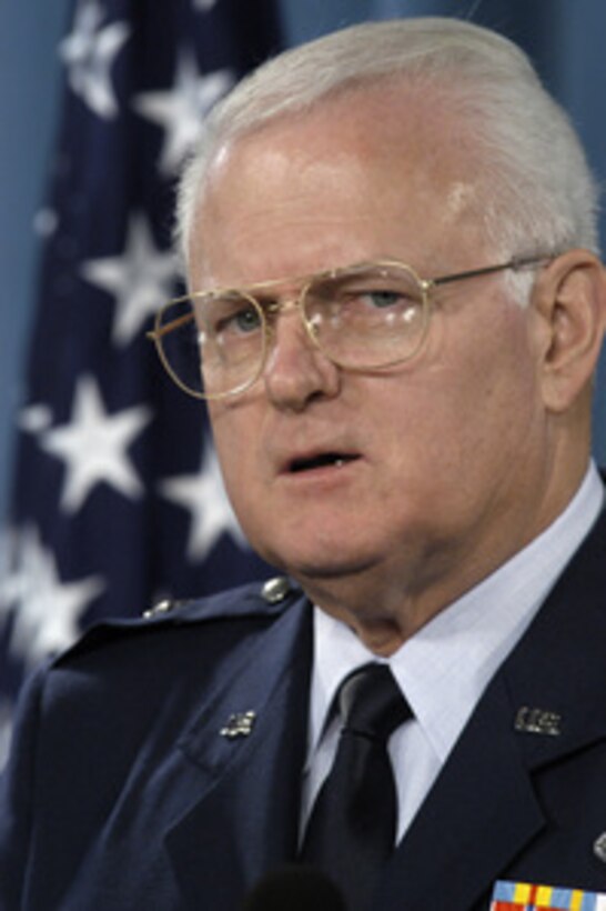 Brig. Gen. Thomas L. Hemingway, U.S. Air Force, updates reporters on the preliminary hearings for military commissions that began this week in Guantanamo Bay, Cuba, during a Pentagon briefing on Aug. 26, 2004. Hemingway is the legal advisor to the appointing Authority for the Office of Military Commissions. 