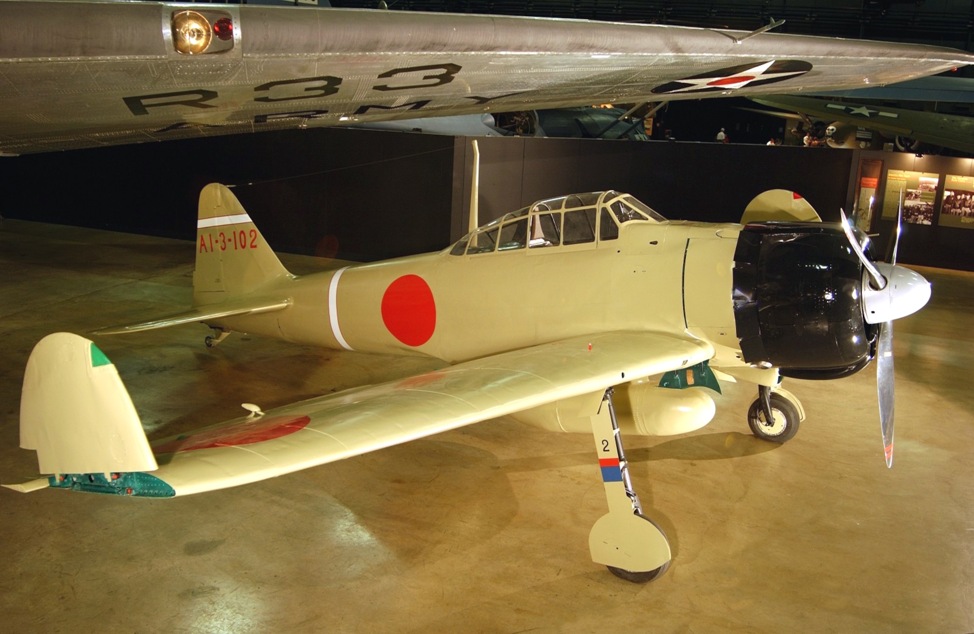 DAYTON, Ohio -- The U.S. Air Force Museum's Japanese Zero is on display under the wing of the B-18A in the museum's Air Power Gallery.  The gallery chronicles the history of the U.S. Army Air Forces in World War II.  (Courtesy photo)