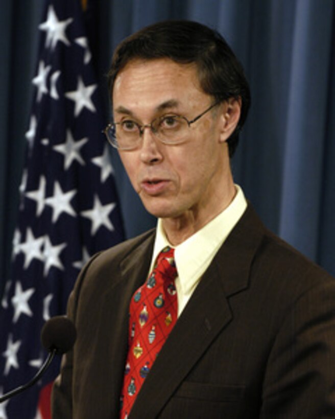 Deputy Under Secretary of Defense for Personnel and Readiness David S. C. Chu presents the DoD Inspector General Report on Air Force Academy Sexual Misconduct at a Pentagon press briefing on Dec. 7, 2004. 