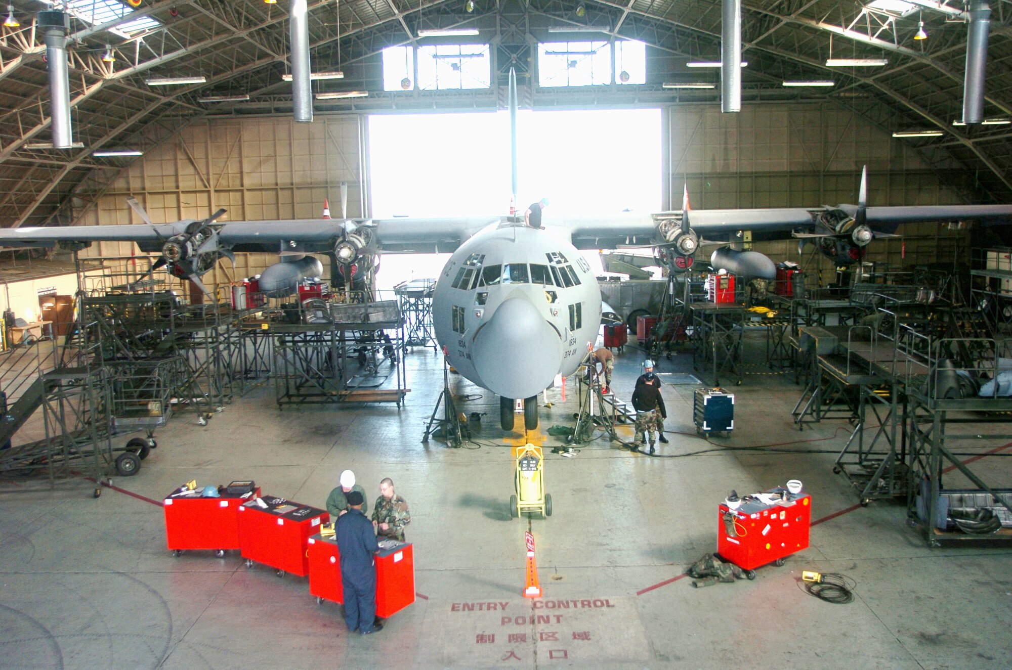 YOKOTA AIR BASE, Japan -- Airmen from the 374th Maintenance Squadron here conduct a major annual inspection on a C-130 Hercules.  The mechanics ensure the Pacific Air Force C-130 fleet is in top condition.  Each inspection lasts about two weeks. (U.S. Air Force photo by Master Sgt. Val Gempis)