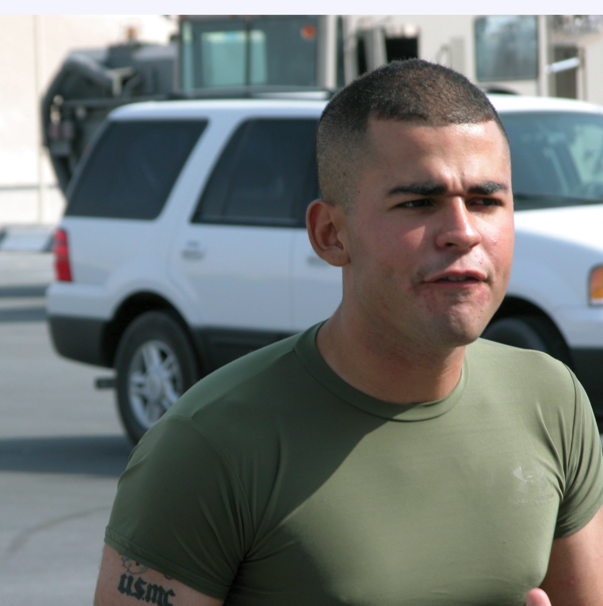 SOUTHWEST ASIA -- Marine Sgt. Luis Mercado barks orders as he instructs a martial arts class at a forward-deployed location.  Sergeant Mercado teaches Marines Corps-style hand-to-hand combat training to Airmen on his off-duty time.   (U.S. Air Force photo by Staff Sgt. Bryan Bouchard) 
