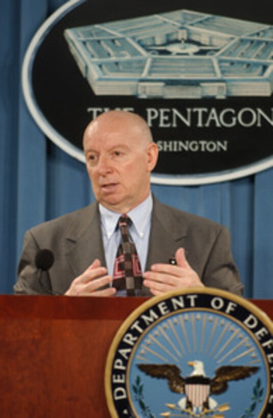 Director of the Iraq Project and Contracting Office Charles Hess briefs the press in the Pentagon on reconstruction progress in Iraq on Dec.15, 2004. 