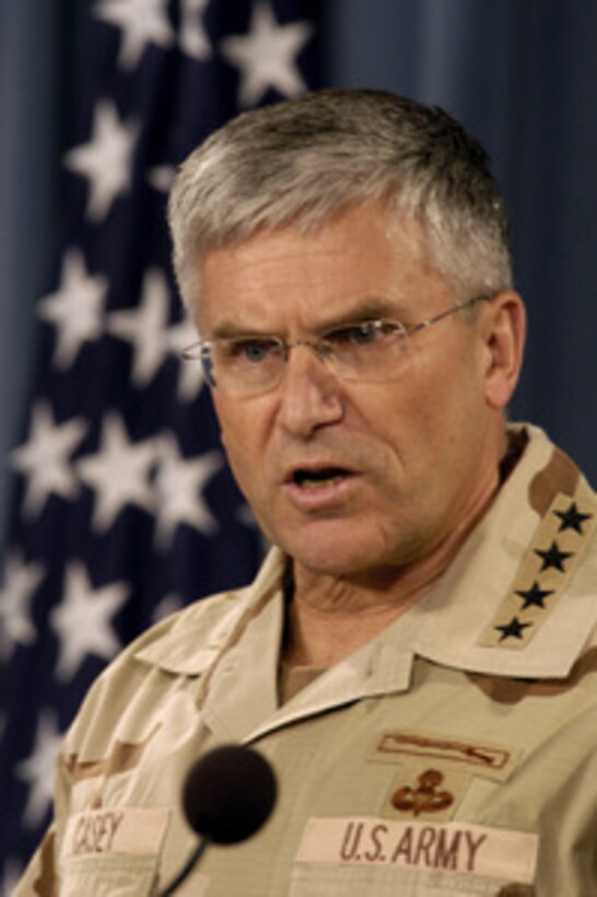 Commander, Multi-National Force Iraq Gen. George W. Casey Jr., U.S. Army, answers a reporter's question during an operational update on Iraq in the Pentagon on Dec. 16, 2004. Casey briefed reporters on the coalition's progress in Iraq and the upcoming Iraqi elections. 