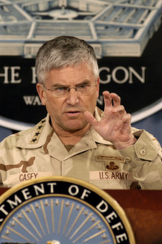 Commander, Multi-National Force Iraq Gen. George W. Casey Jr., U.S. Army, answers a reporter's question during an operational update on Iraq in the Pentagon on Dec. 16, 2004. Casey briefed reporters on the coalition's progress in Iraq and the upcoming Iraqi elections. 
