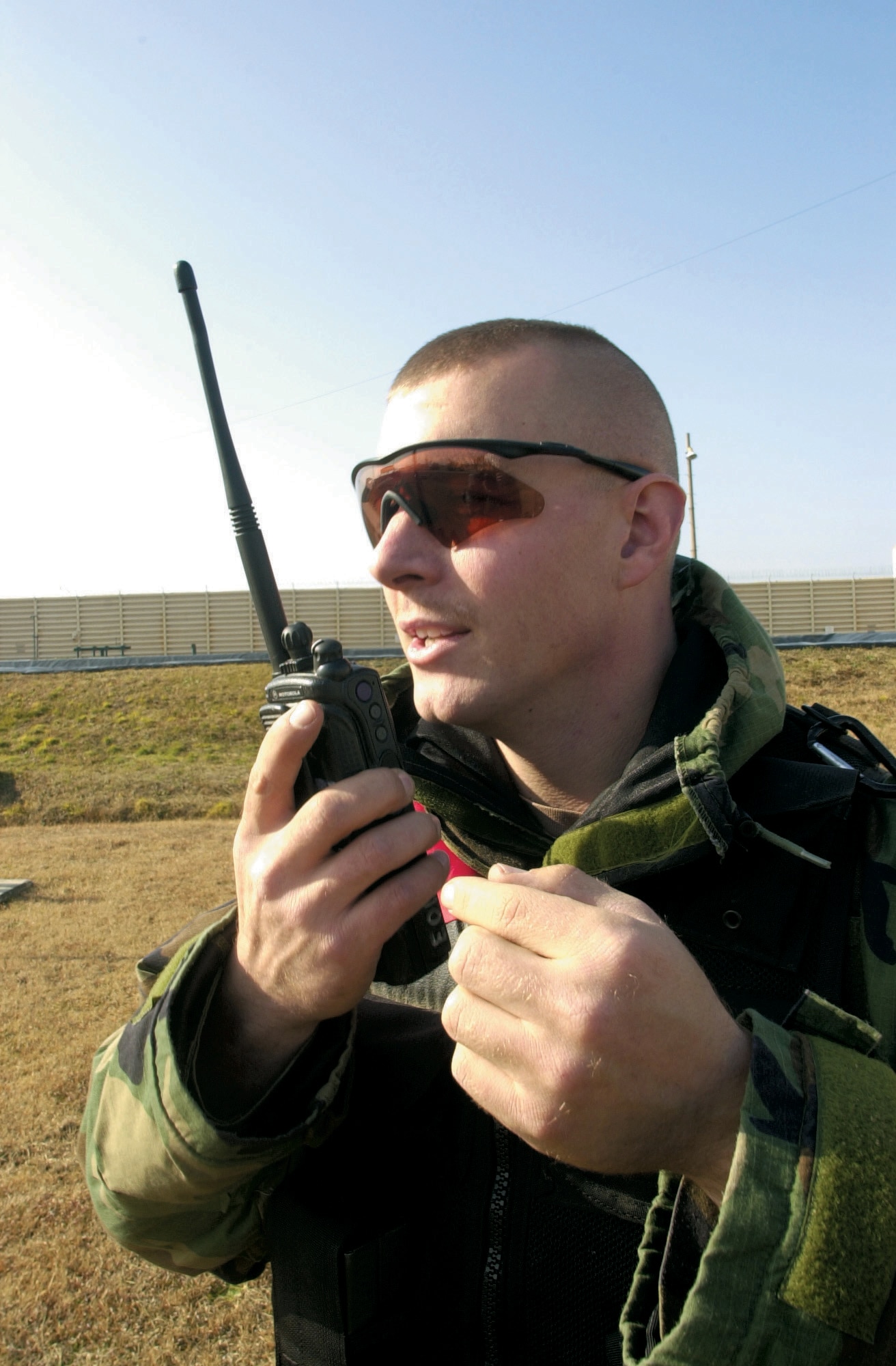 KUNSAN AIR BASE, South Korea -- Staff Sgt. John McCoy calls the safety status of an explosive here Dec. 16.  He is assigned to the 8th Civil Engineer Squadron explosive ordnance disposal flight.  (U.S Air Force Photo by Staff Sgt. Alan Port)