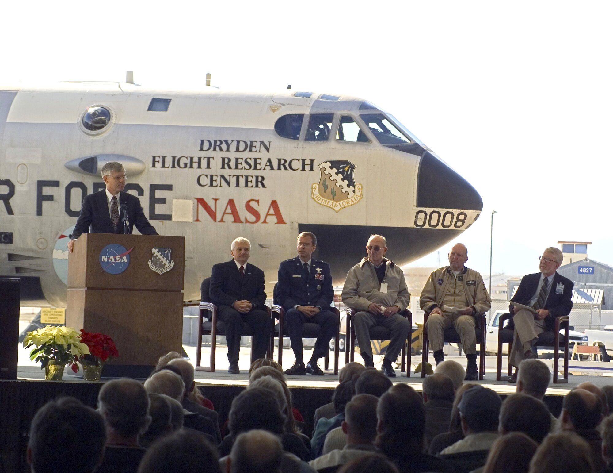 EDWARDS AIR FORCE BASE, Calif. -- NASA's B-52B was officially retired during a ceremony here Dec. 17 after nearly 50 years of dropping advanced research vehicles.  Attending the ceremony were (from left) retired NASA research pilot Ed Schneider; Kevin Petersen, NASA Dryden Flight Research Center director; Brig. Gen. Curtis Bedke, Air Force Flight Test Center commander; retired NASA pilot Fitz Fulton; current NASA pilot Gordon Fullerton; and AFFTC chief historian James Young.  (National Aeronautics and Space Administration photo by Tom Tschida) 